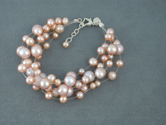 Bracelet artisanal en perles d'argile émaillée bleu clair - Simbi